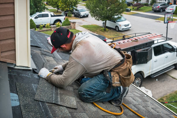 Professional Roofing technician working in Jewett City, CT